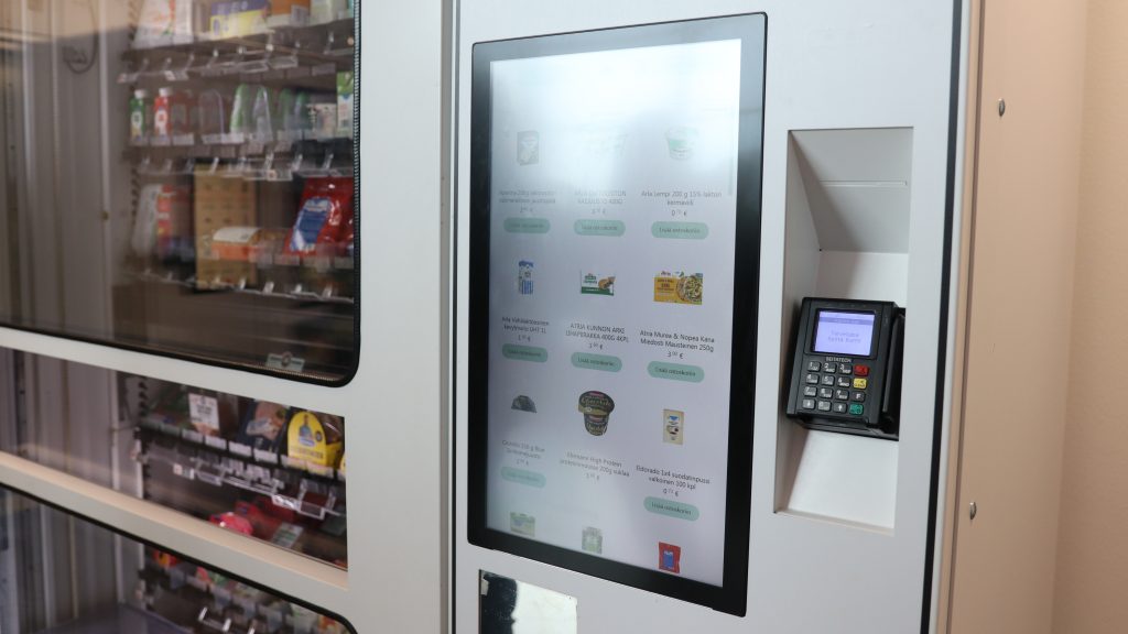 A vending machine, where people can buy food, beverages and hygiene products