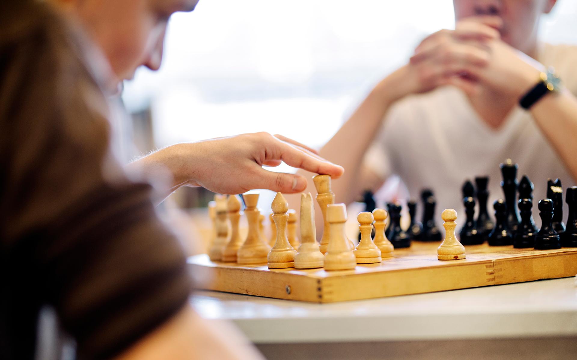 Prisoners play chess. Prisoners play chess.